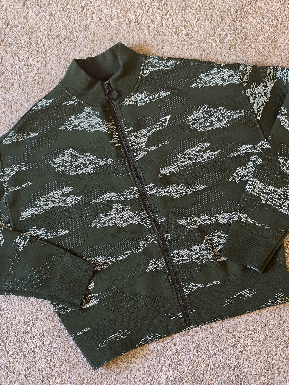 Gymshark Women’s Olive Green Zip-Up Jacket with Light Gray Pattern